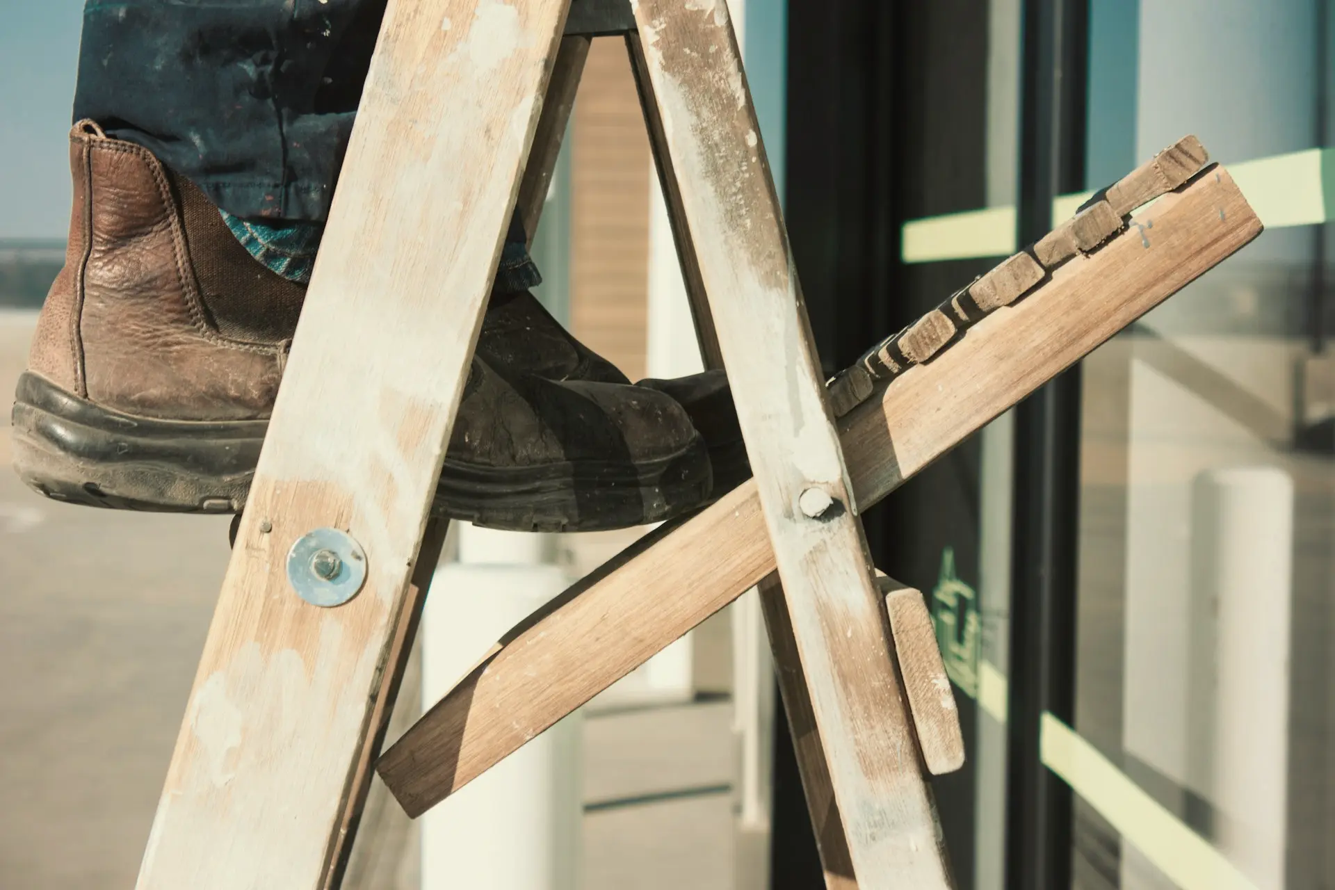 person standing on ladder